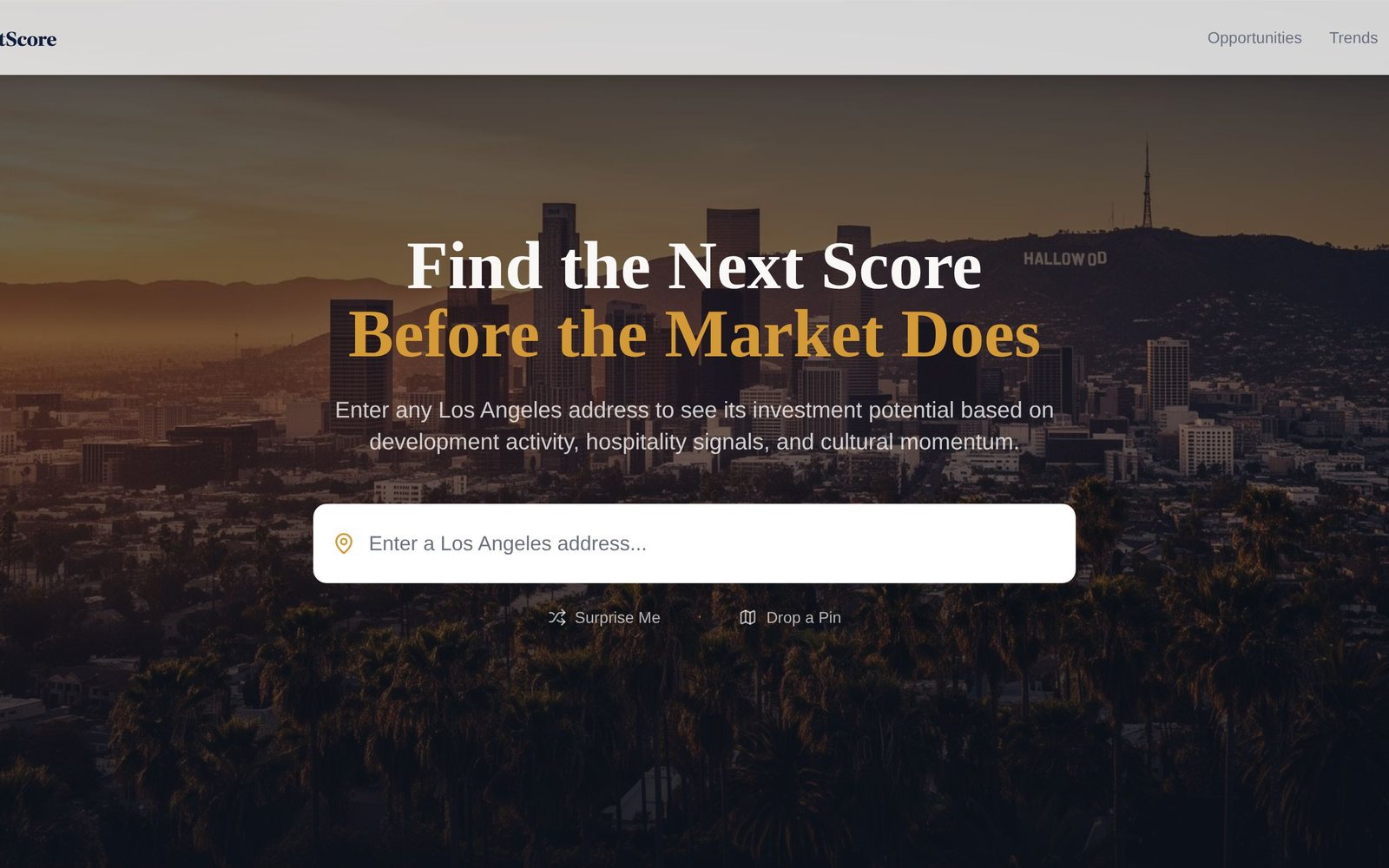 The NextScore home page, with an address search over a view of Los Angeles at sunset